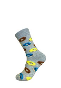 Calzino grigio con motivi di ciambelle colorate in blu, giallo e marrone, mostrato in profilo con il tallone e il piede chiaramente visibili.