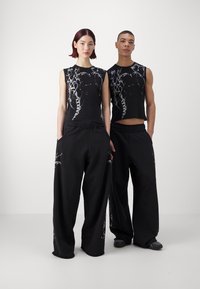 Jaded London LAZY WILLY MONSTER JOGGER UNISEX - Calças de fato de treino - black