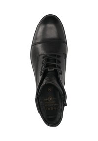 Bottine en cuir noir à lacets avec fermeture éclair sur le côté et intérieur rembourré, vue du dessus sur fond blanc.