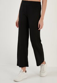LELA REGULAR FIT - Hlače - black
