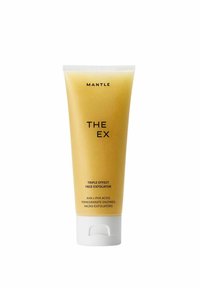 Gul klemmetube med hvidt låg, mærket "THE EX" af Mantle. Teksten angiver "TRIPLE EFFECT FACE EXFOLIATOR," fremhæver AHA, PHA og enzymer.