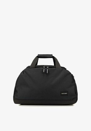 Borsa duffel nera realizzata in tessuto resistente, con manici superiori doppi, chiusura con zip e una piccola etichetta con il logo "WITTCHEN".