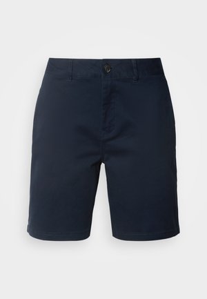 Navy blue shorts made of cotton, featuring a button and zipper closure, flat front, and side pockets with a smooth texture.