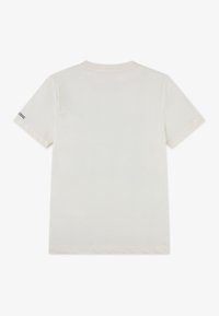 Majica kratkih rukava od kremaste pamuka, s okruglim izrezom i kontrastnim mornarsko plavim logom na lijevom rukavu, glatke teksture i opuštenog kroja.