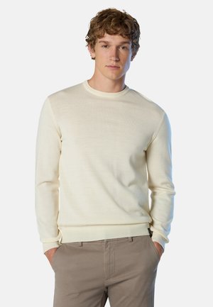 Maglione beige chiaro a maniche lunghe con scollo rotondo, realizzato in materiale lavorato a maglia liscio. Presenta polsini e orlo a costine.