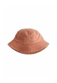 Bucket hat i mjuk, urtvättad korallfärgad tyg. Har en bred, flexibel skärm och en strukturerad yta. Sömnadsdetaljer vid basen.