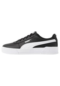 Black and white sneakers with a smooth synthetic upper, lace-up closure, padded collar, and a textured white rubber sole.