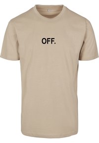 Krémové tričko s krátkým rukávem a černým potiskem "OFF." umístěným na hrudi, velikost střední, s kulatým výstřihem.