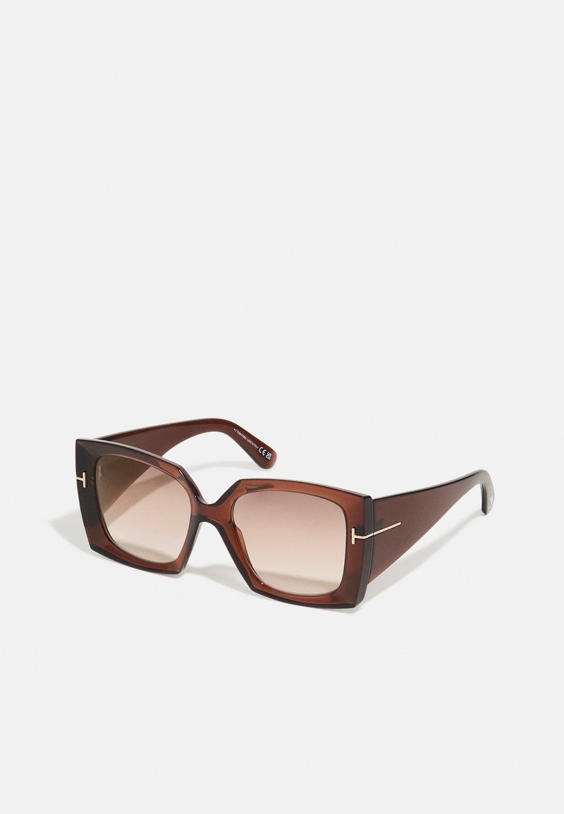 Brown gradient sunglasses with a chunky square frame, glossy finish, and metallic accent on the side. Lens showcases a smooth transition in tint.