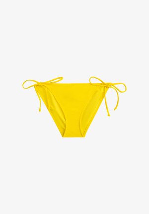 Parte inferior de bikini amarilla con cierres atados a cada lado. Fabricada en material suave, con un diseño simple y cobertura mínima.