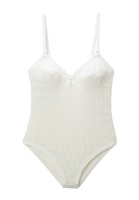 Body blanc avec bretelles ajustables, présentant un motif en dentelle florale et un petit charm au centre. Texture lisse, design ajusté et fermeture pression.