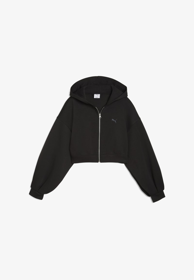 Felpa nera a maniche lunghe con zip e maniche oversize, con un discreto logo Puma sul davanti. Sfondo semplice.