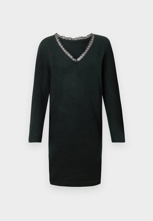 Vestido de malha preto de mangas longas com decote em V, apresentando um delicado acabamento de renda em forma de ondas.