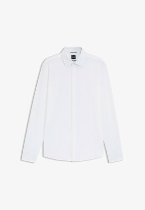 Camisa blanca de manga larga con cuello clásico, cierre de botones en el frente y puños abotonados, con una textura suave y sin patrones visibles.