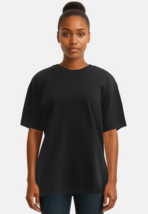 Zwarte oversized t-shirt gemaakt van een katoenmix, met korte mouwen, een ronde hals en een losse pasvorm. Geen opvallende patronen of accenten.