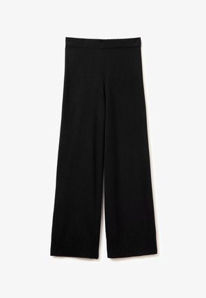 Pantaloni neri a gamba larga con una vita a costine e polsini strutturati, realizzati in un materiale morbido ed elastico. Nessun motivo visibile o accessorio.
