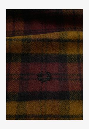 Tessuto a quadri nei colori bordeaux, giallo senape e nero con un piccolo emblema di alloro ricamato in nero al centro.