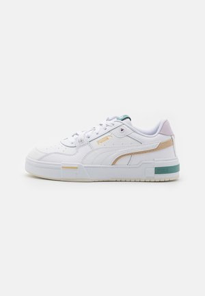 White sneaker with a textured leather upper, featuring pastel accents in gold, teal, and pink. Thick sole with defined grooves and branding.