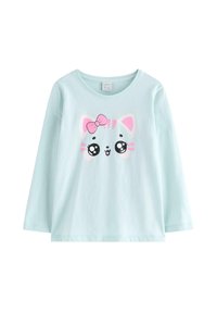 Vaaleansininen pitkähihainen puuvillapaita, jossa on painettu kissan kasvot vaaleanpunaisin yksityiskohdin ja rusetti, pyöreä pääntie ja rento istuvuus.