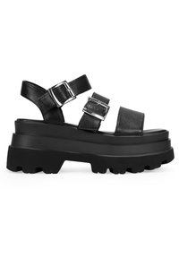 Sandali platform neri con due cinturini regolabili a fibbia, realizzati in materiale sintetico testurizzato, dotati di una suola in gomma spessa.