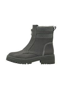 Bottines grises avec une texture lisse, fermeture éclair sur le côté, doublure en faux cuir, et accents métallisés en haut. Semelle épaisse à crampons pour une meilleure adhérence.
