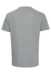 T-shirt in cotone grigio con colletto tondo e maniche corte. Texture liscia, vestibilità standard e senza loghi o decorazioni visibili.