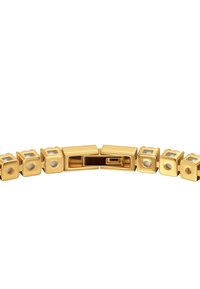 Kullavärvi käevõru, millel on ruudukujulised lülid ringikujuliste avadega. Sile ja läikiv viimistlus turvalise kinnitussüsteemiga.