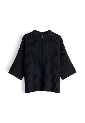 Black ribbed knit pullover with a high neckline, dropped shoulders, and wide sleeves. Features a half zipper at the front.