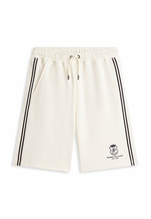 Roomkleurige shorts met trekkoord, zwarte strepen aan de zijkant, zijzakken en een Tommy Hilfiger-logo op het linkerbeen.