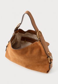 Brown suede handbag with a curved shape, leather accents, a single strap, and gold-tone hardware. Lined interior features a zipper pocket.