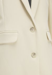 Blazer Rita relaxed solid birch - Rubia