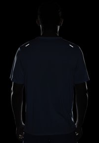 Nike Performance RISE - Camiseta deportiva - university blue