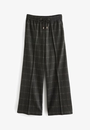 Pantalones de pierna ancha gris oscuro con patrón cuadriculado sutil y cintura elástica con cordón negro con puntas metálicas.