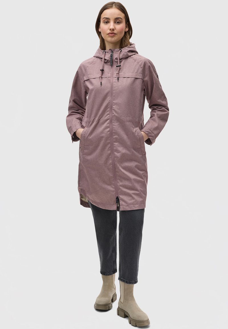 Water-resistant light purple jacket with a hood, zipper front, elastic cuffs, and side pockets, paired with black jeans and beige ankle boots.