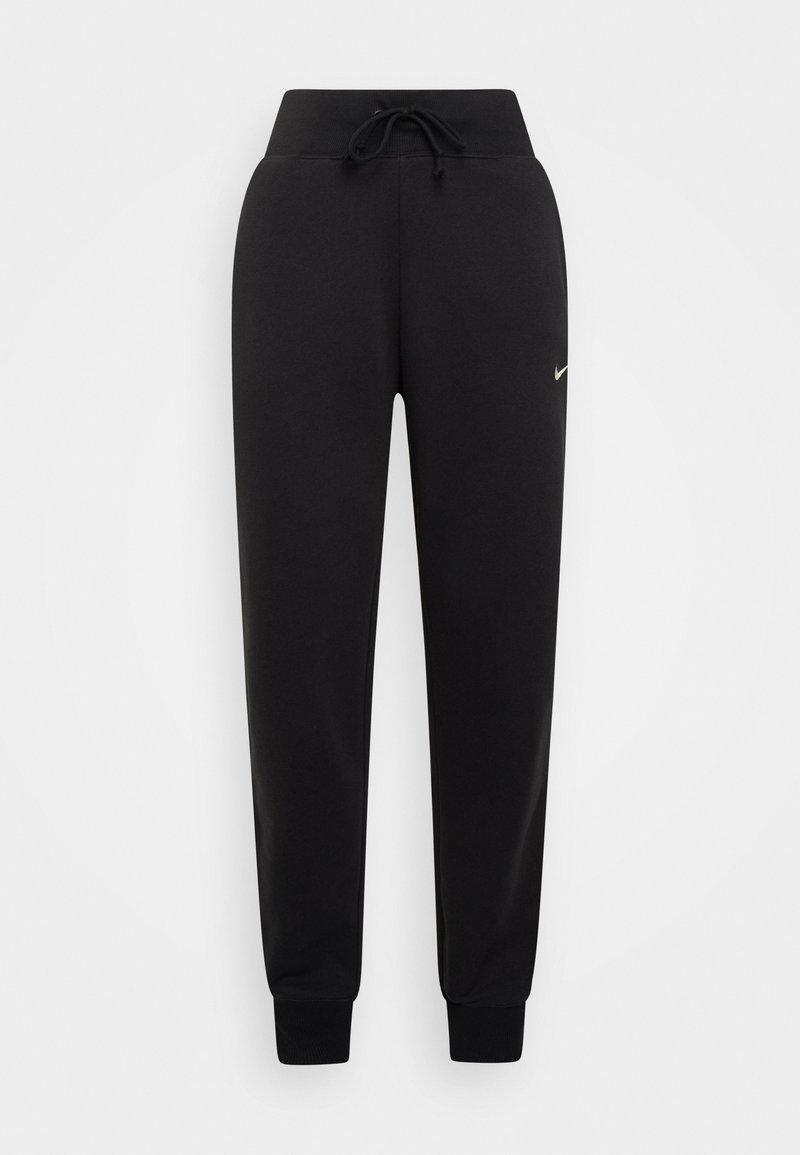 Pantalones jogger negros hechos de una tela suave, con una cintura ajustable con cordón, puños acanalados y un pequeño logo de Nike en dorado en el lado izquierdo.