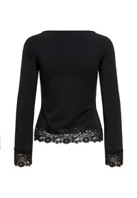 Haut noir à manches longues avec bordure en dentelle florale à l'ourlet et aux poignets, vu de dos sur un fond blanc.