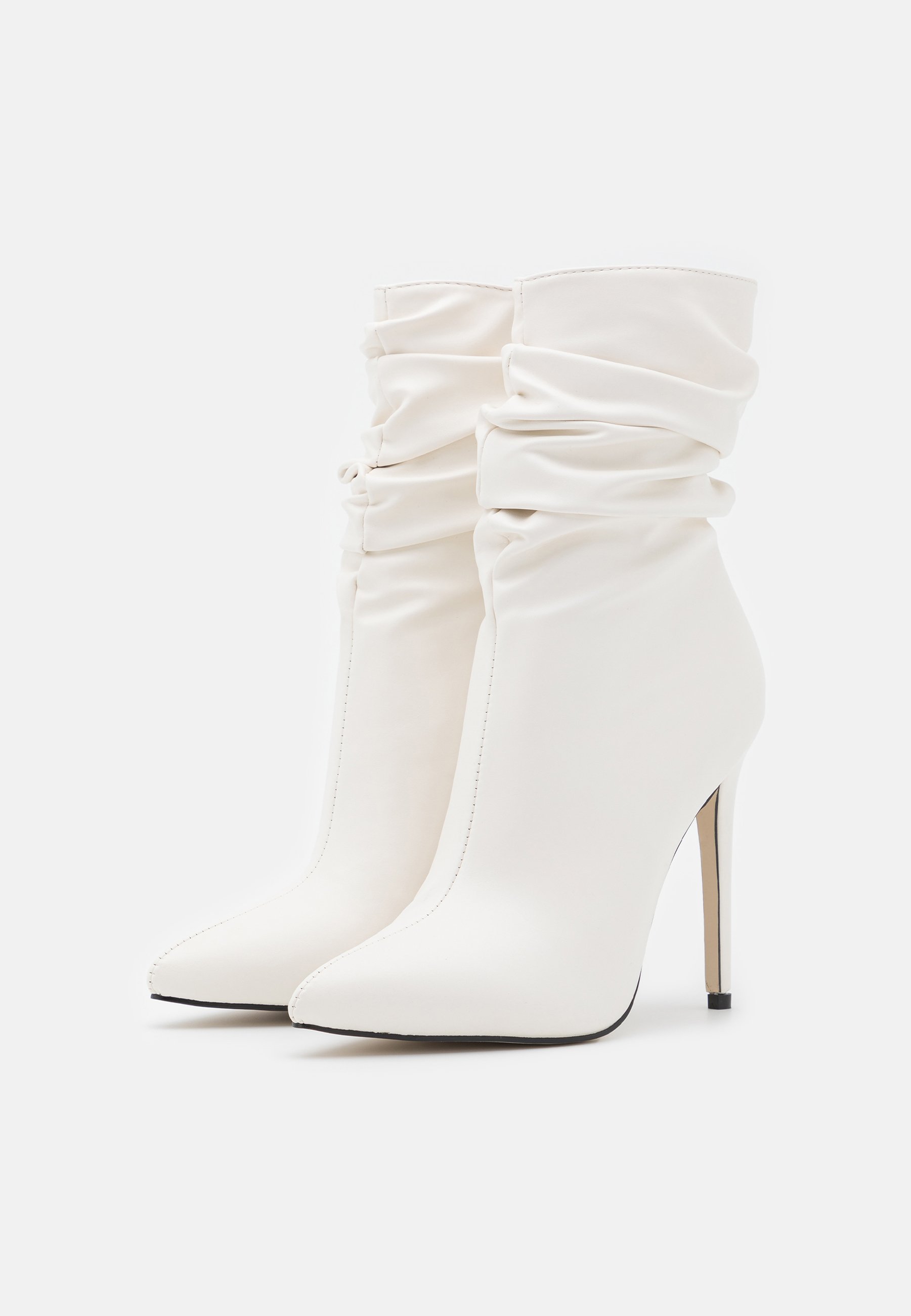 white strappy boots
