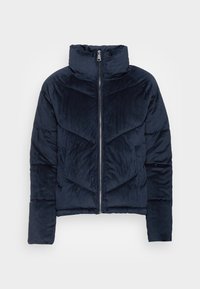 Granatowa pikowana kurtka puffer z sztruksu z wysokim kołnierzem, zamkiem błyskawicznym i wzorem w kształcie jodełki. Miękka w dotyku z puszystą izolacją.