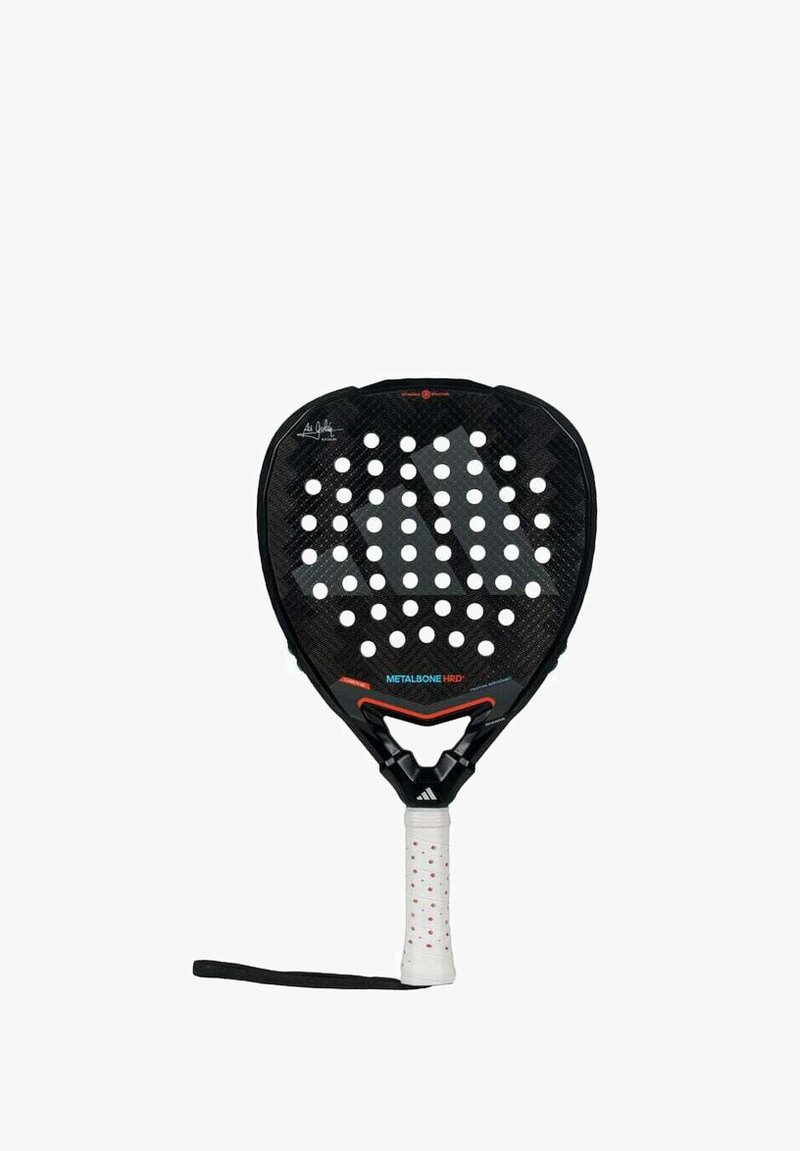 Paddle racket with a black carbon fiber surface and white holes, featuring a textured grip handle with red accents and adjustable strap.