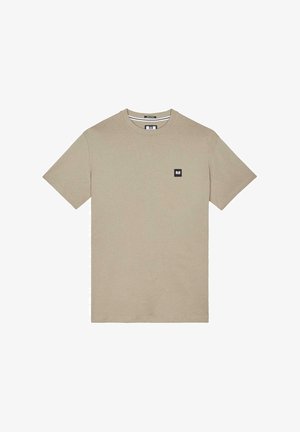 Jasno beżowa bawełniana koszulka z okrągłym dekoltem, krótkimi rękawami i małą czarną prostokątną naszywką logo na lewej piersi.