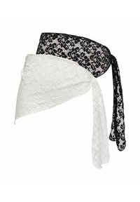 Deux foulards en tissu de dentelle, un noir et un blanc, noués avec de longs pans pendants, exposés sur un fond blanc.
