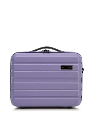 Purple hard-shell suitcase with horizontal grooves, a black handle, and brand logo. Smooth texture with robust hardware for durability.