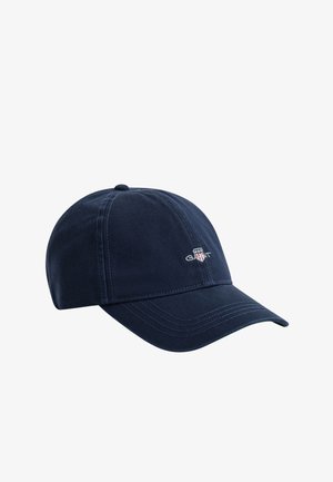 Marineblaue Baseballkappe mit gebogenem Schirm und genähten Einsätzen, vorne mit kleinem gesticktem GANT-Logo mit Schild.