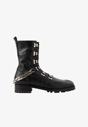 Christian Louboutin, Bottines à plateau - black
