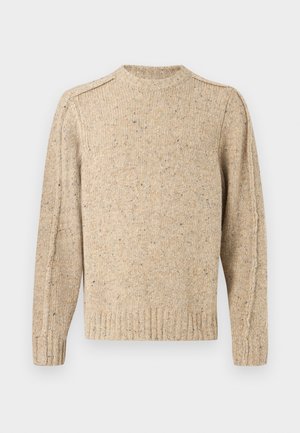 Pulover bej tricotat cu pete discrete multicolore, mâneci lungi, manșete, tiv și decolteu rotund cu rebrodare.