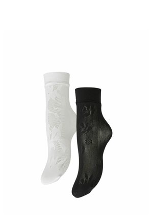 Par ankel-lange, transparente strømper med blomsterprint, én sort og én hvid, vist mod en hvid baggrund.