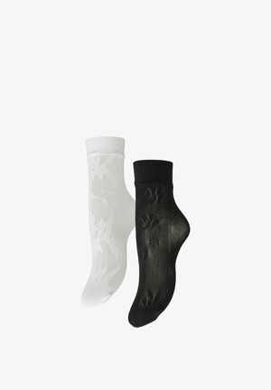 Paar knöchellanger, durchsichtiger Socken mit Blumenmuster, ein schwarzer und ein weißer, vor weißem Hintergrund dargestellt.