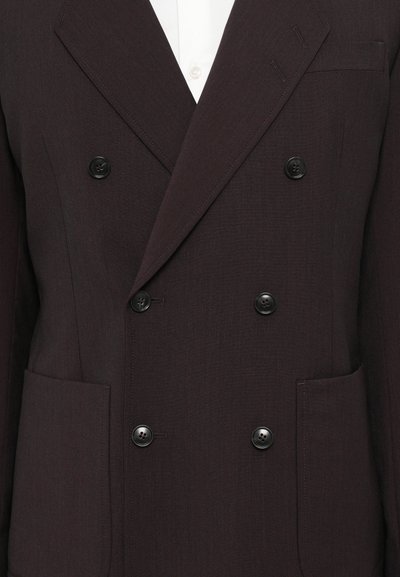 Dunkelbrauner, doppelt gegenteiliger Blazer aus strukturiertem Stoff. Mit schwarzen Knöpfen, zwei vorderen Taschen und einem Spitzenaufschlag-Design.
