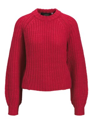 Il maglione rosso lavorato a maglia presenta un classico scollo a girocollo, maniche lunghe a raglan, polsini a costine e una tessitura testurizzata in tutto il capo.