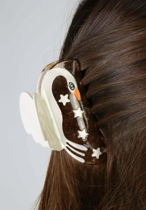 Spinka do włosów w kształcie łabędzia wykonana z brązowego plastikowego marmuru z białymi skrzydłami, pomarańczowym dziobem i gwiazdkowymi detalami. Nadaje się do zabezpieczania włosów.